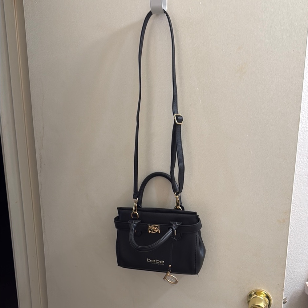Bebe Black Satchel with Structured Design and Adjustable Strap